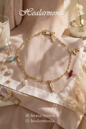 پابند طلایی آویز فشن با مروارید آب شیرین اصل از برند تاش - وارداتی